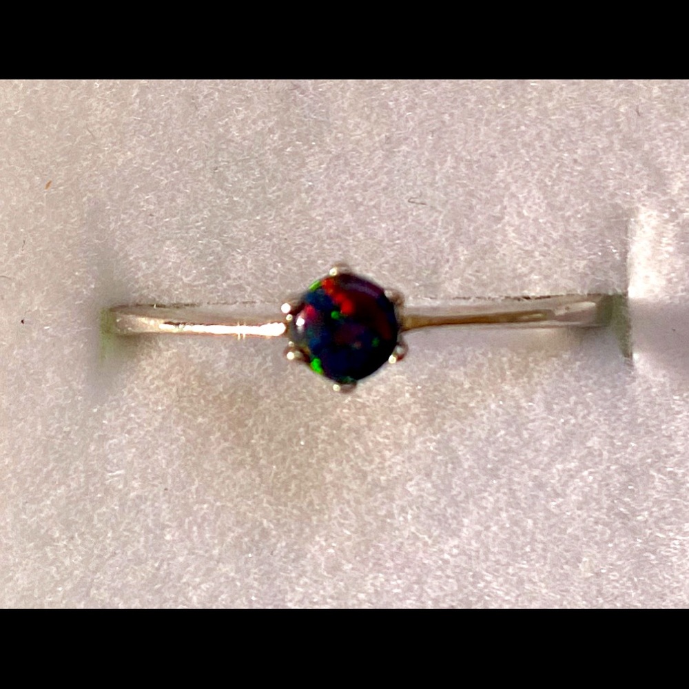 Sterling silver and lab created black opal ring. Size 9.